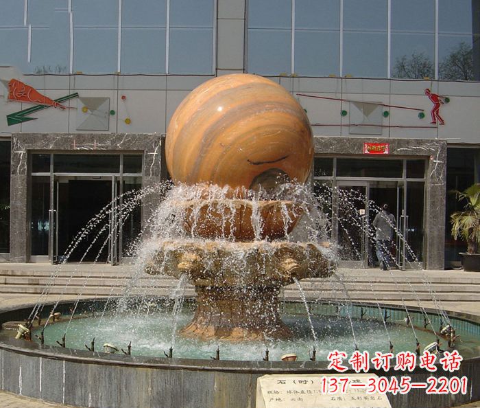 杭州石来运转球晚霞红风水球石雕